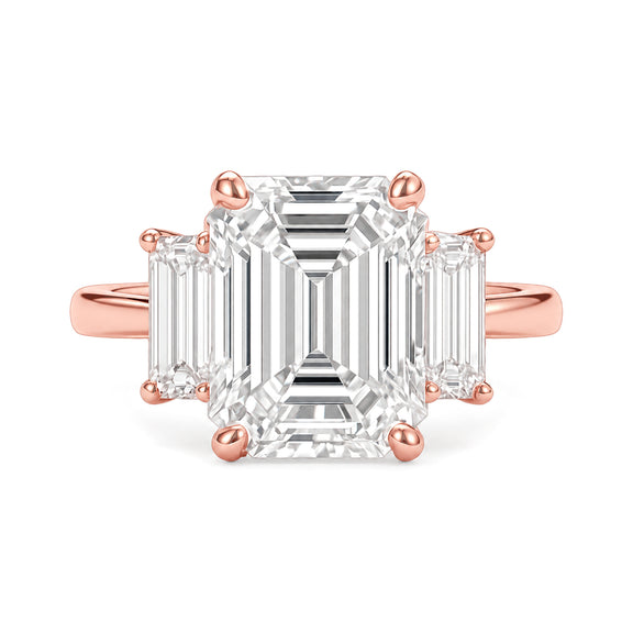 Ella Ring Lab Diamond rose gold emerald-cut three-stone ring on a white background