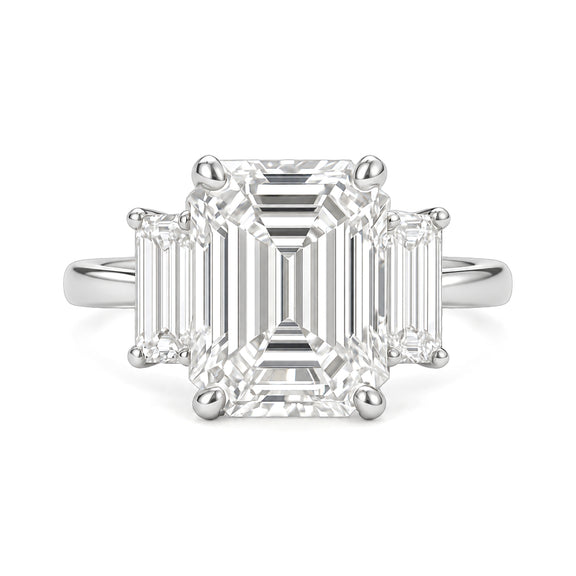 Ella Ring white gold emerald-cut three-stone diamond ring on a white background